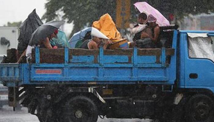 Cars tossed, buildings damaged as typhoon Goni pummels Japan