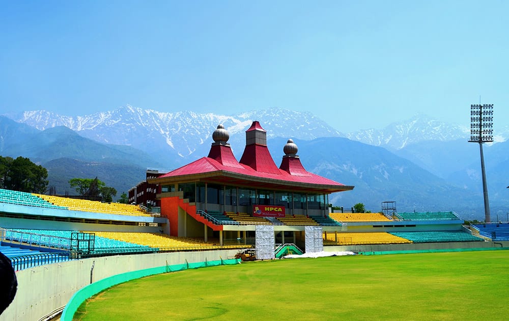 Dharamshala Stadium flanked by the Dhauladhar Range.