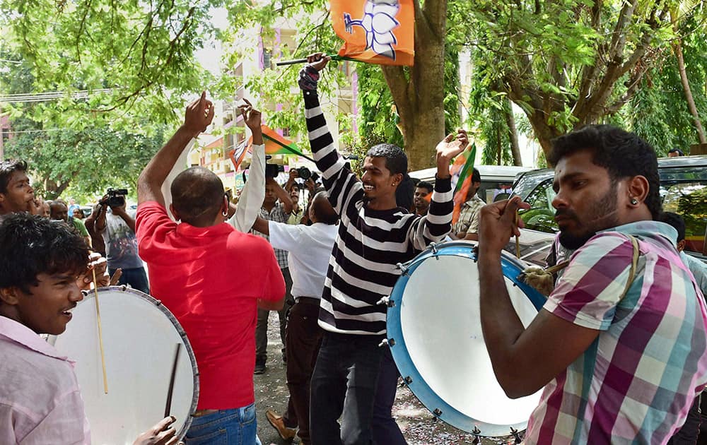 BJP workers celebrate the partys victory in BBMP (Bruhat Bengaluru Mahanagara Palike) elections in Bengaluru.