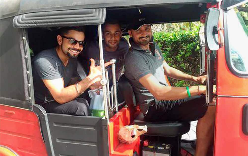 Indian captain Virat Kohli, Stuart Binny and Harbhajan Singh enjoying a tuk tuk ride in Colombo.
