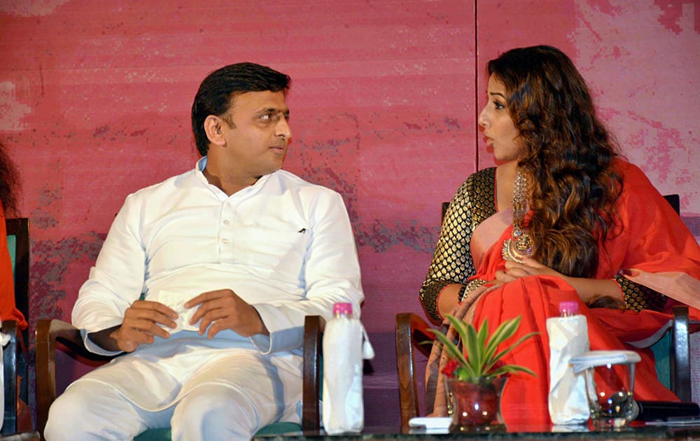 Uttar Pradesh Chief Minister Akhilesh Yadav and actress Vidya Balan during a Swachh Banega India programme in Lucknow.