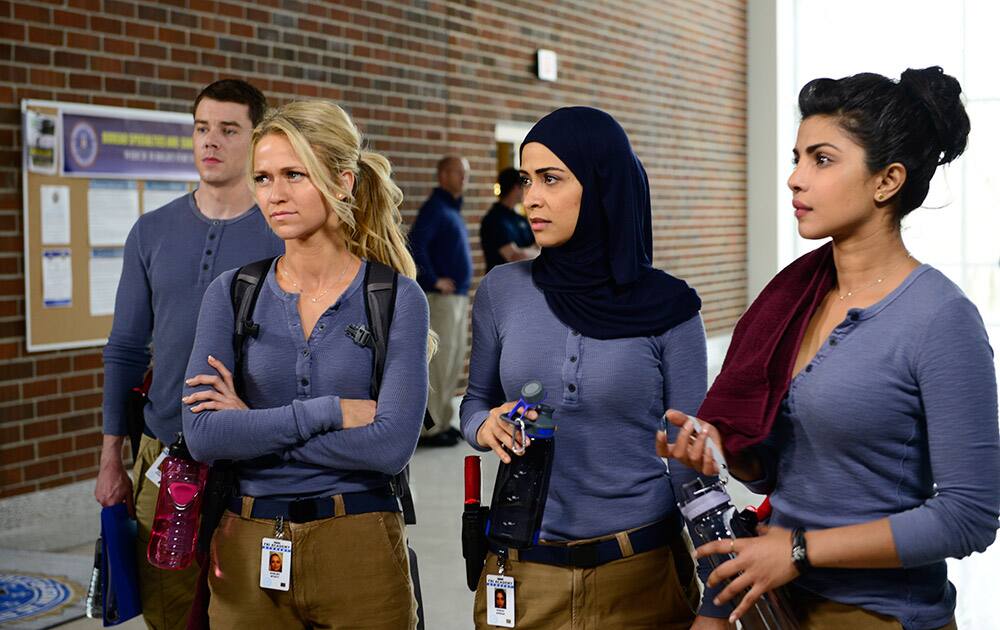 from left, Johanna Braddy, Yasmine Al Massri and Priyanka Chopra appear in a scene from 