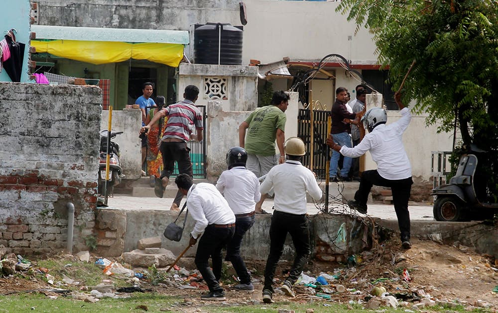 Police resort to lathicharge after violent clashes between Patel community and OBC members at Juna Wadaj locality in Ahmedabad.