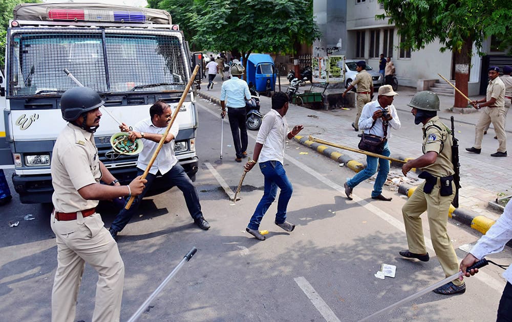 Police lathicharge Patel community members after their agitation for reservation turned violent in Ahmedabad.