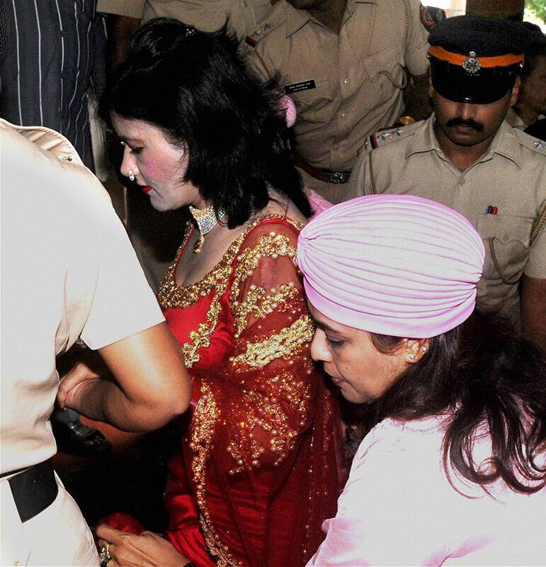 Radhe Maa arrives at Kandivali Police Station in Mumbai.