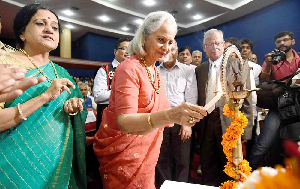 Veteran actress Waheeda Rehman lightning the lamp to inaugurate Tigerland India Film Festival in Bhopal.