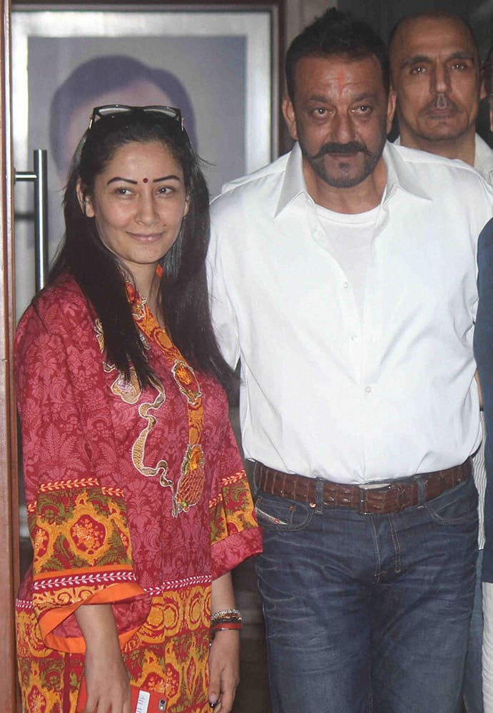 Actor Sanjay Dutt with his wife Manyata in Mumbai on Wednesday, after he released on 30 days furlough from Yerwada Jail.
