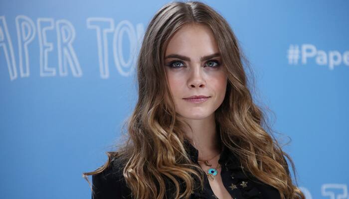 Red hot: Cara Delevingne goes nude to promote lipstick!