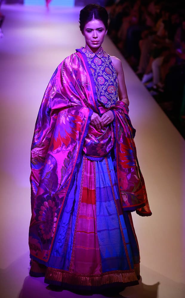 A model displays a creation of designer Krishna Mehta during the Lakme Fashion Week in Mumbai.