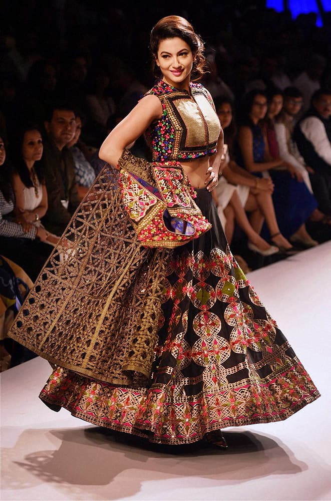 Bollywood actress and model Gauhar Khan walks the ramp during the Lakme Fashion Week.