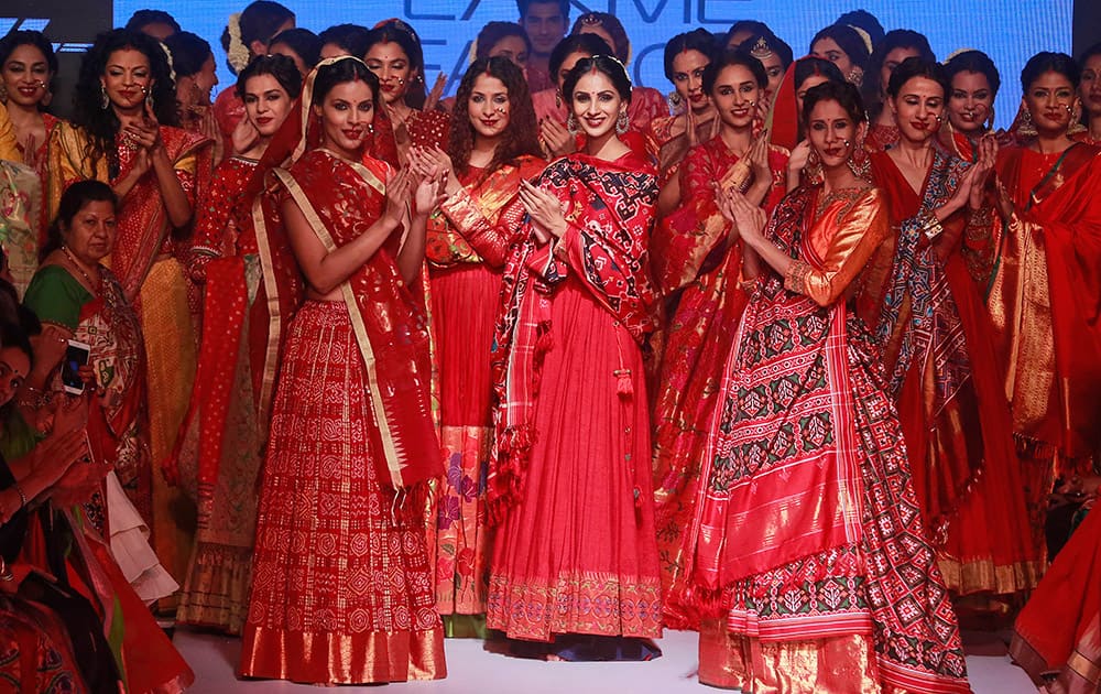 Models present creations of designer Gaurang during the Lakme Fashion Week in Mumbai.