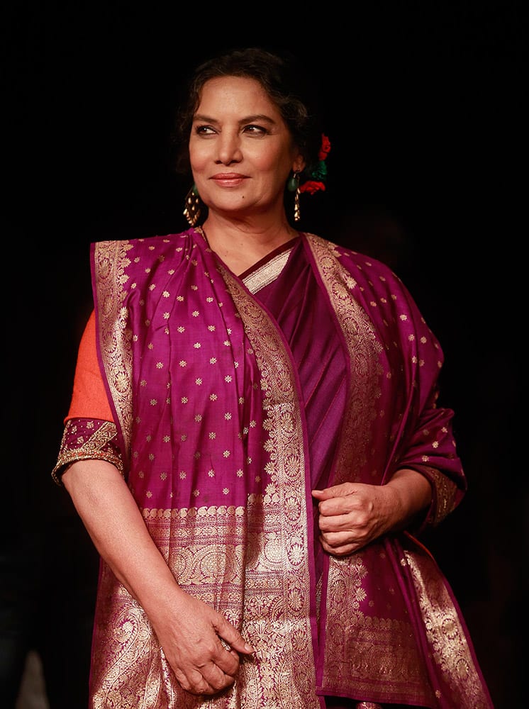 Shabana Azmi poses for photographs during the Lakme Fashion Week in Mumbai.