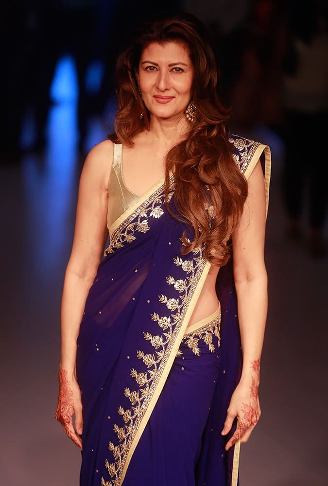 Sangeeta Bijlani posses for a picture during the Lakme Fashion Week in Mumbai.