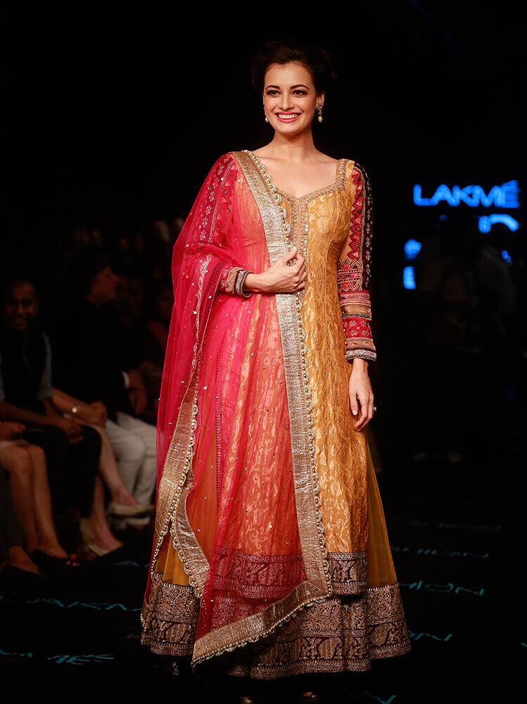 Dia Mirza poses for photographs during the Lakme Fashion Week in Mumbai.