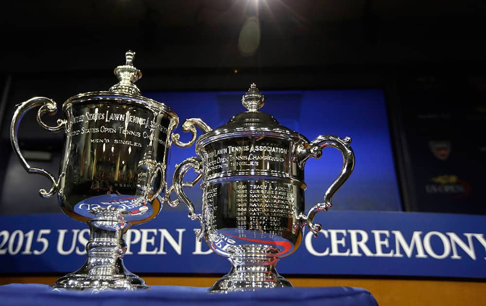 The US Open mens's and women's singles tennis trophies are displayed before the US Open Draw Ceremony at the USTA Billie Jean King National Tennis Center in New York.