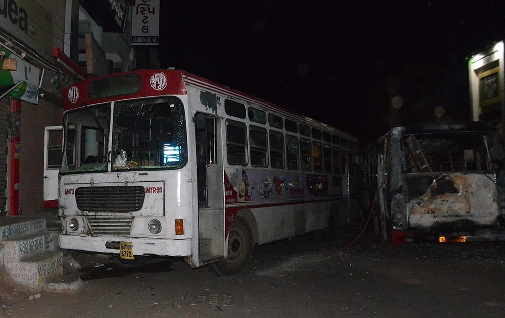 The charred remains of the vehicles in Bapunagar area of Ahmedabad which were set on fire after the incidents of violence following the Patel (Patidar) communitys reservation rally.