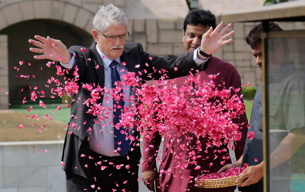 Mogens Lykketoft, President of the General Assembly of the United Nations offers floral tributes at Rajghat, a memorial to Mahatma Gandhi, in New Delhi.