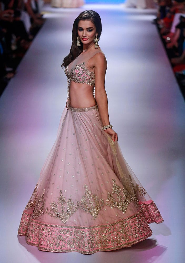 Bollywood actress Amy Jackson displays a creation by designer Anushree Reddy during the Lakme Fashion Week in Mumbai.