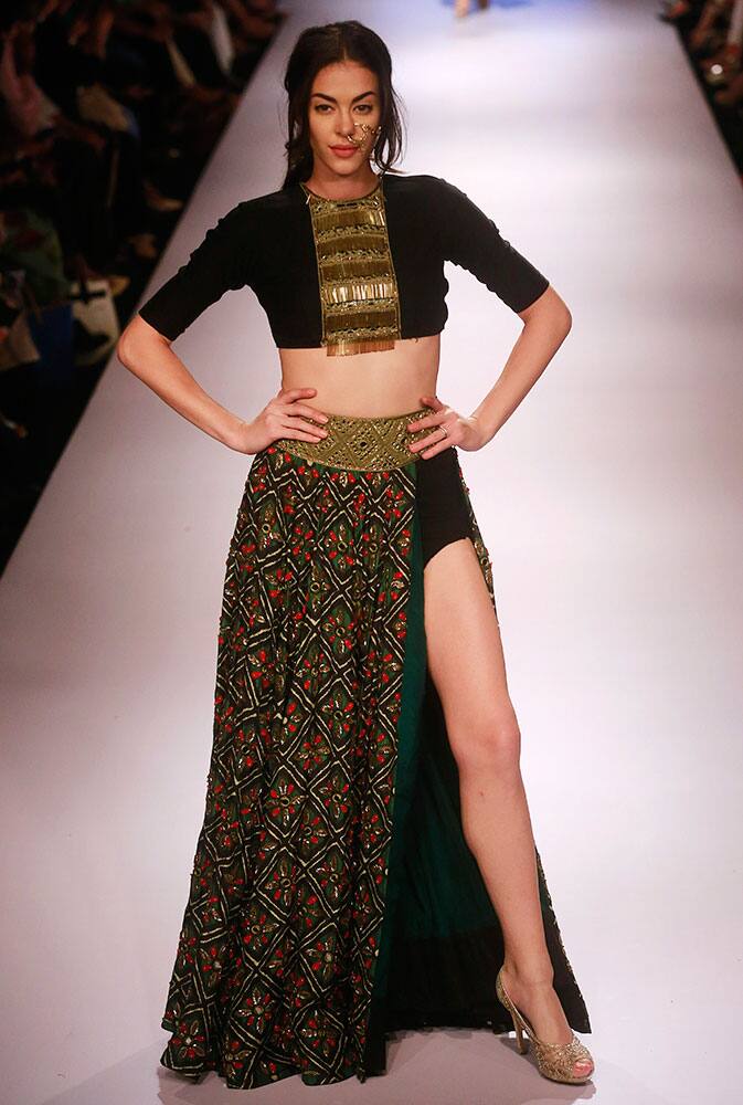 A model displays a creation by designer Arpita Mehta during the Lakme Fashion Week in Mumbai.