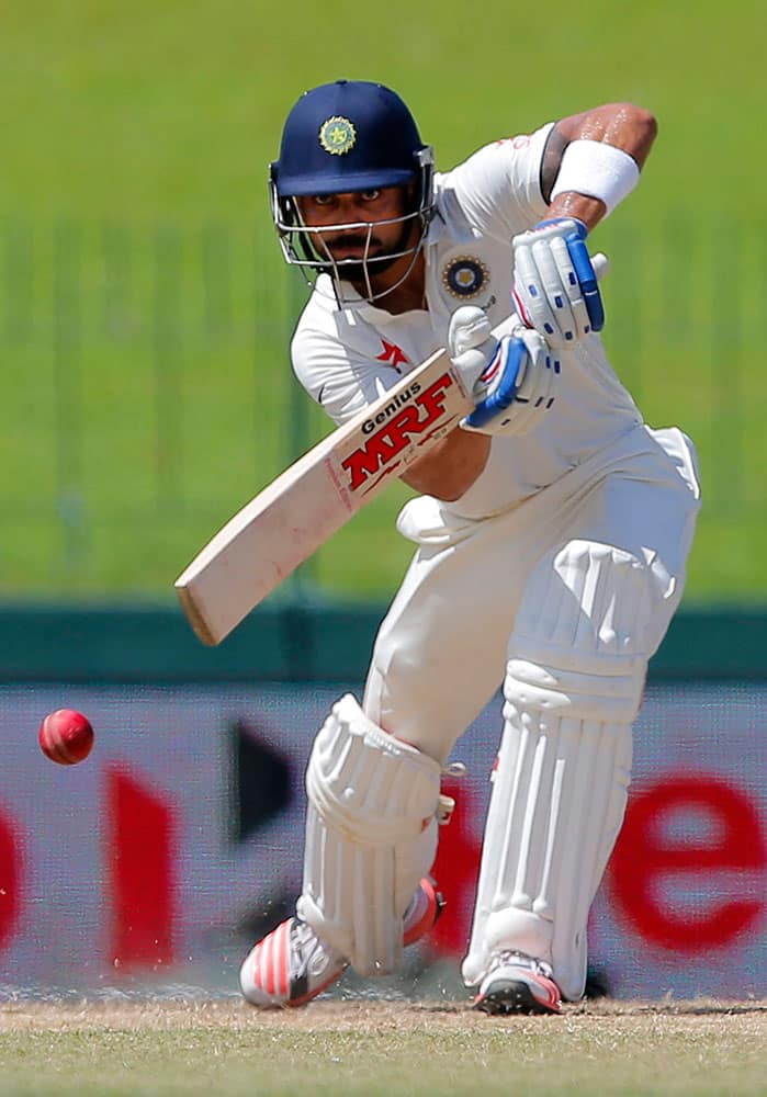 India's Virat Kohli plays a shot on day four of the third cricket test match against Sri Lanka in Colombo, Sri Lanka.