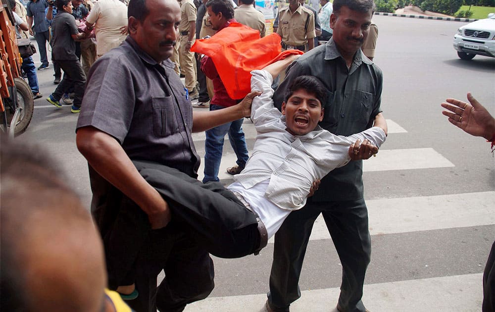 Police detaining PDSU activists who were staging protest against the AP Government on the first day of Assembly session in Hyderabad.