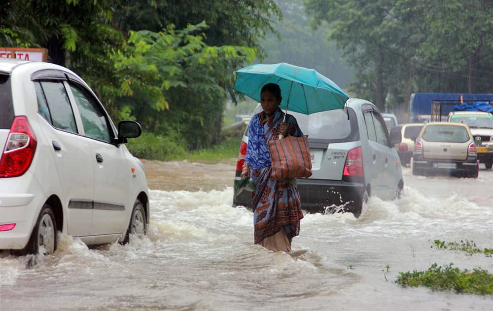 Flood-hit Upper Assams National Highway 38 at Margherita in Tinsukia district of Assam.
