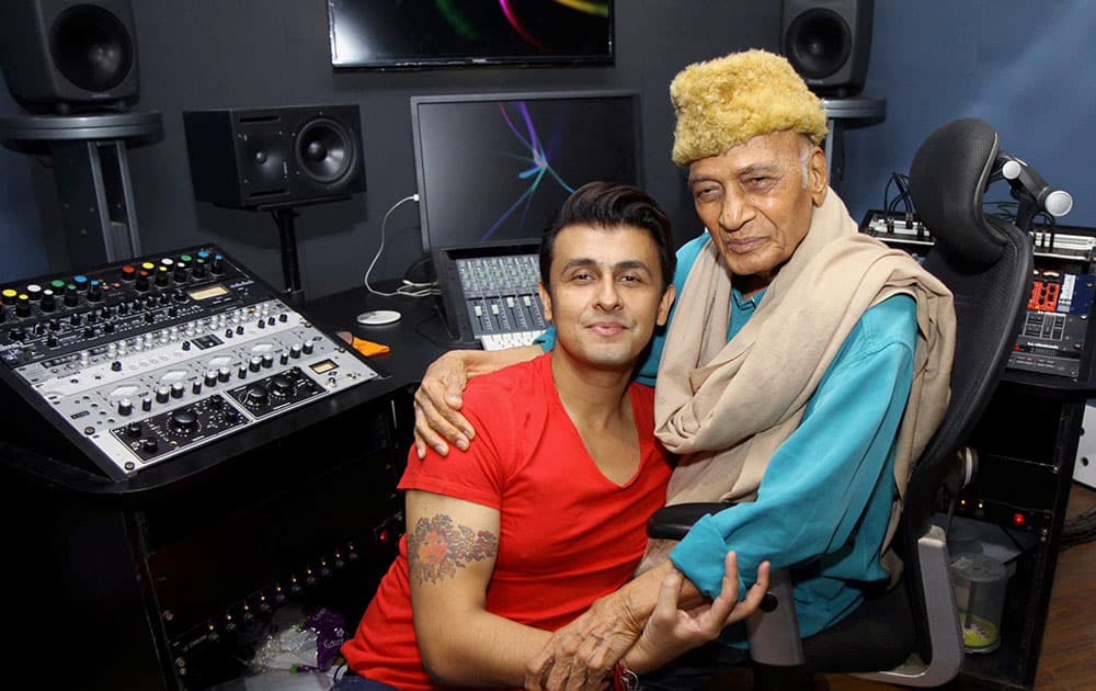 Bollywood singer Sonu Nigam and music director Khayyam at song recording of film Gulam Bandhu in Mumbai.
