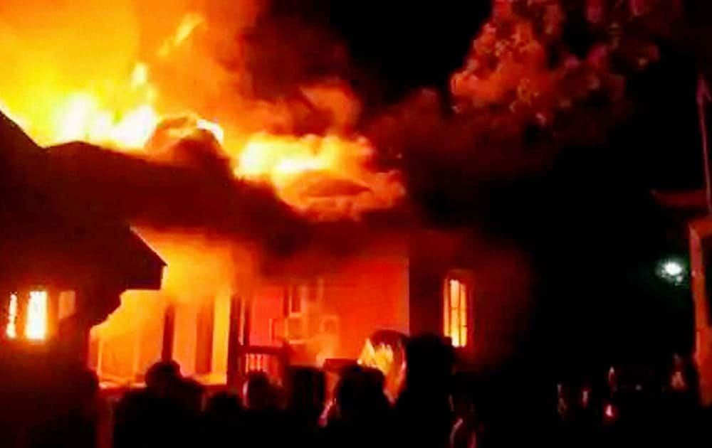 A mob set ablaze the residences of a Manipur minister and two other legislators in Imphal on Monday evening to protest against the passage of allegedly “anti-tribal” bills in the 60-member assembly.