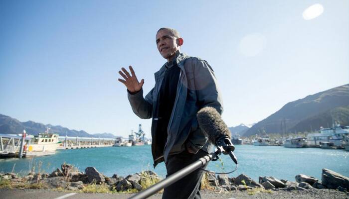 Obama tours glacier to highlight march of climate change