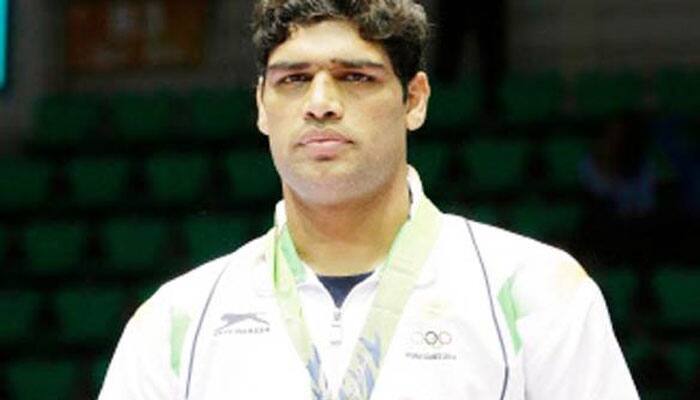Satish Kumar in Asian boxing semis, books World Championship berth ...