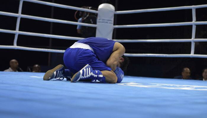 'Gold medal-winning' national boxer now cleans 'garbage ...