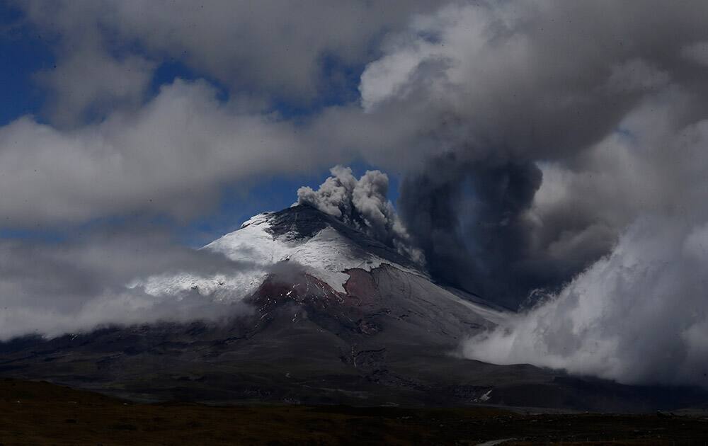 The Cotopaxi volcano spews ash and vapor, as seen from El Pedregal, Ecuador.