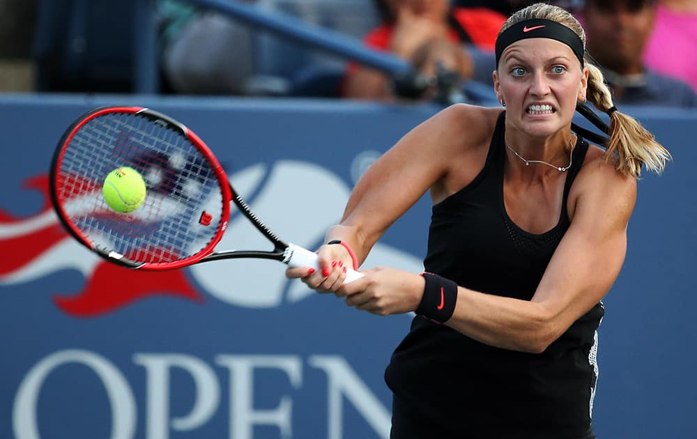 Petra Kvitova, of the Czech Republic, returns a shot to Nicole Gibbs, of the United States, during the second round of the U.S. Open tennis tournament.