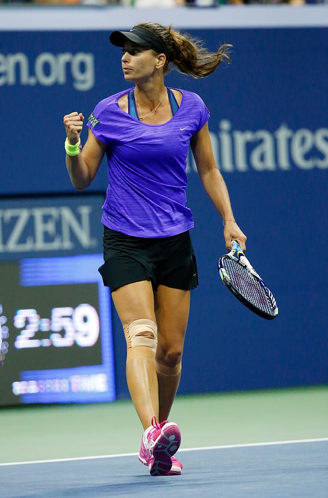 Petra Cetkovska, of the Czech Republic, reacts after taking a point from Caroline Wozniacki, of Denmark, during the second round of the U.S. Open tennis tournament in New York. Cetkovska won 6-4, 5-7, 7-6 (1).