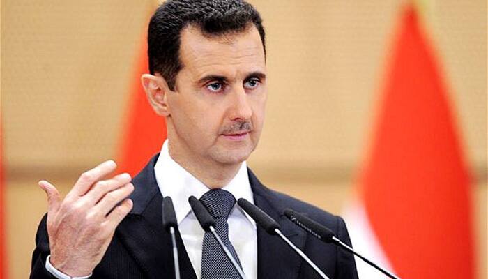 Putin says Assad agrees to early parliamentary polls