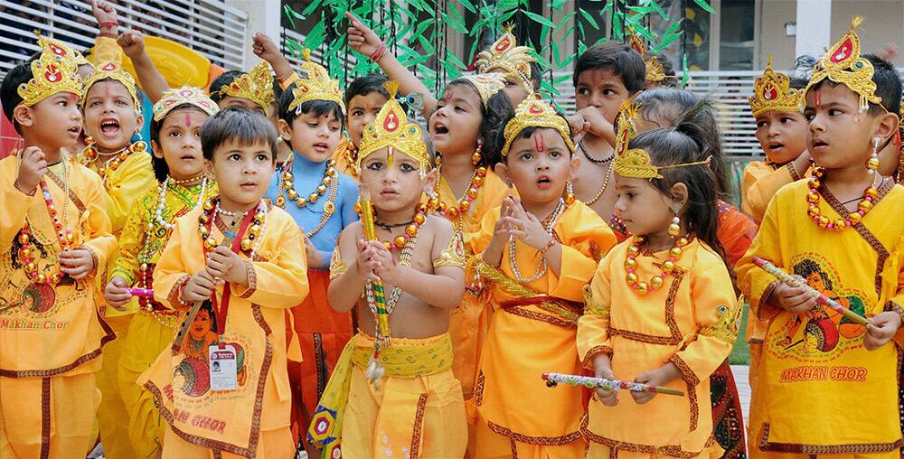 School children dress up as lord Krishna to celebrate Janmashtami at a school in Amritsar.