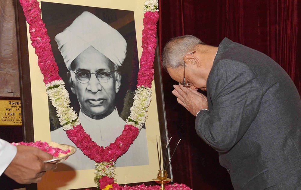 President Pranab Mukherjee paying floral tributes at the portrait of former President Dr Sarvepalli Radhakrishnan on the occasion of his birth anniversary at Rashtrapati Bhavan in New Delhi.