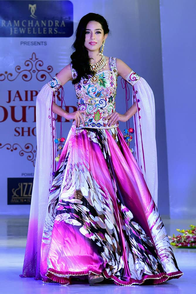 Bollywood actress Amrita Rao walks the ramp during a fashion show in Jaipur.