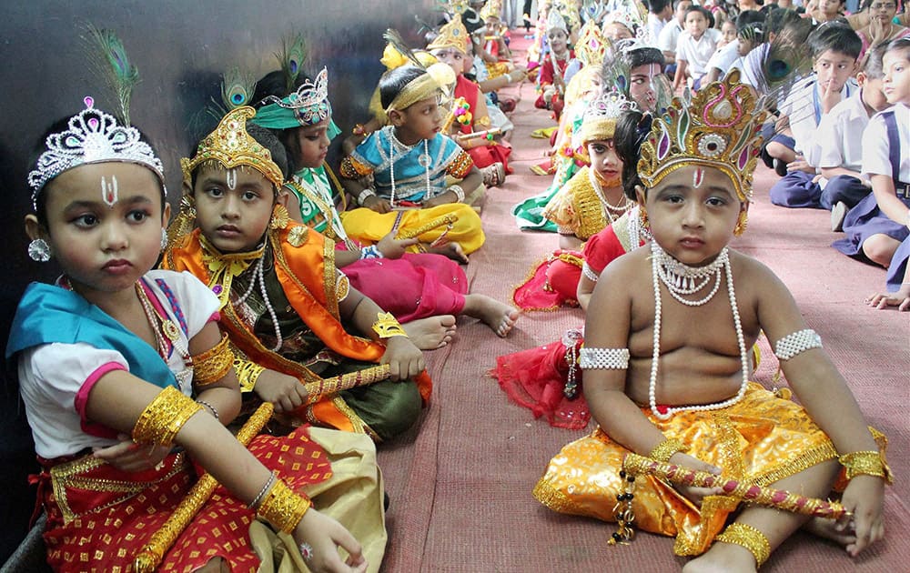 School children dressed up as Lord Krishna during Janmashtami celebrations at a school in Balurghat in South Dinajpur district of West Bengal.