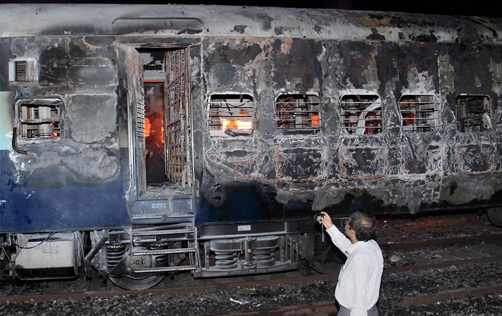 Four coaches each of Dehradun Express and Velakani express, stabled in Kandivali yard, were gutted in fire on Friday mid-night in Mumbai.