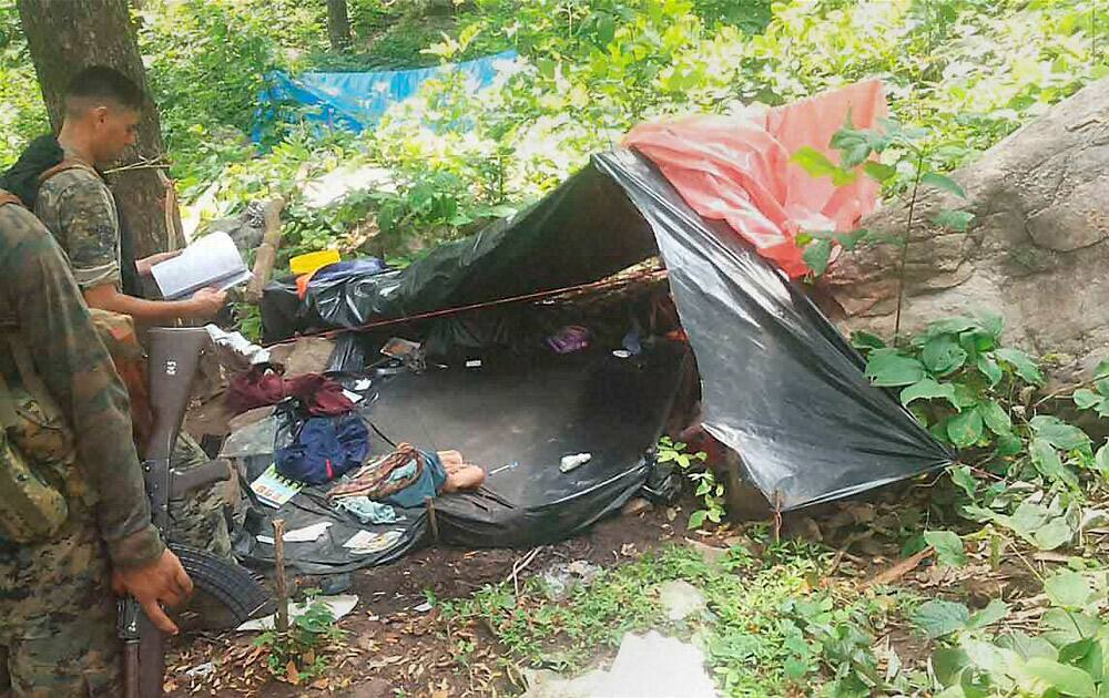 Security forces recover arms and ammunition from a CPI Maoist camp during an operation in the Chhattisgarh-Jharkhand border area.