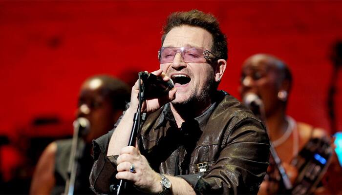 Bono offers support to refugees at U2 concert