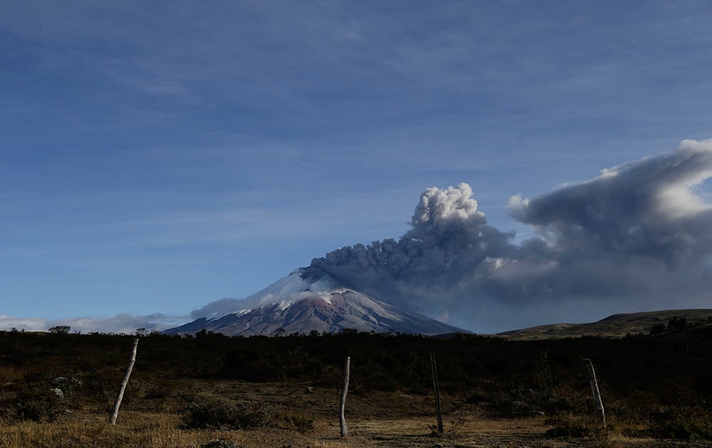The Cotopaxi volcano spews ash and vapor, seen from Loreto, Ecuador.