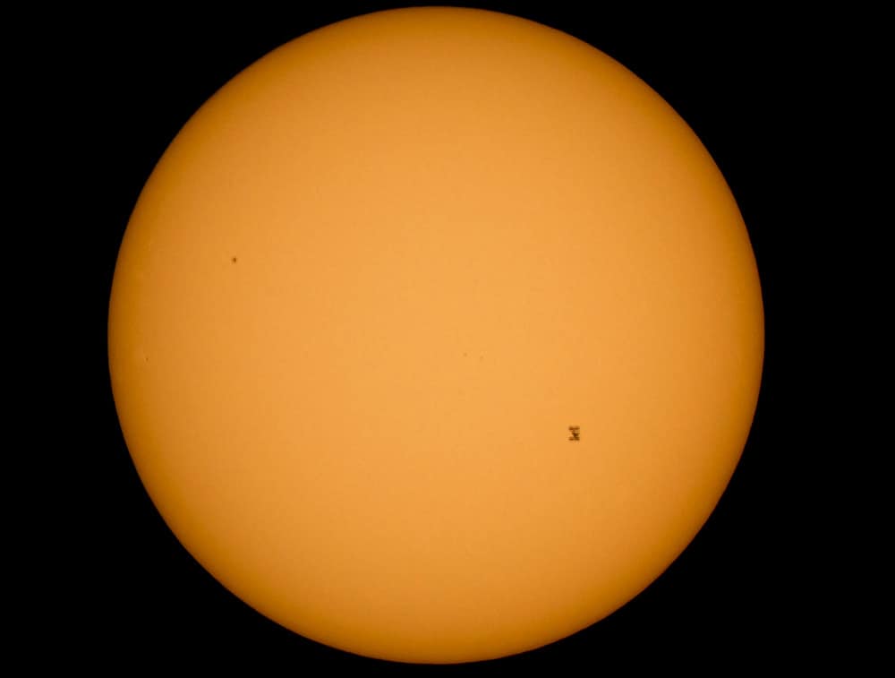 the International Space Station, with a crew of six onboard, is seen in silhouette as it travels across the face of the sun at roughly 5 mps, Sunday, Sept. 6, 2015, as seen from Shenandoah National Park, in Front Royal, Va. Onboard are NASA astronauts Scott Kelly and Kjell Lindgren; Russian cosmonauts Gennady Padalka, Mikhail Kornienko, Oleg Kononenko, Sergey Volkov; Japanese astronaut Kimiya Yui; Danish astronaut Andreas Mogensen and Kazakhstan cosmonaut Aidyn Aimbetov.