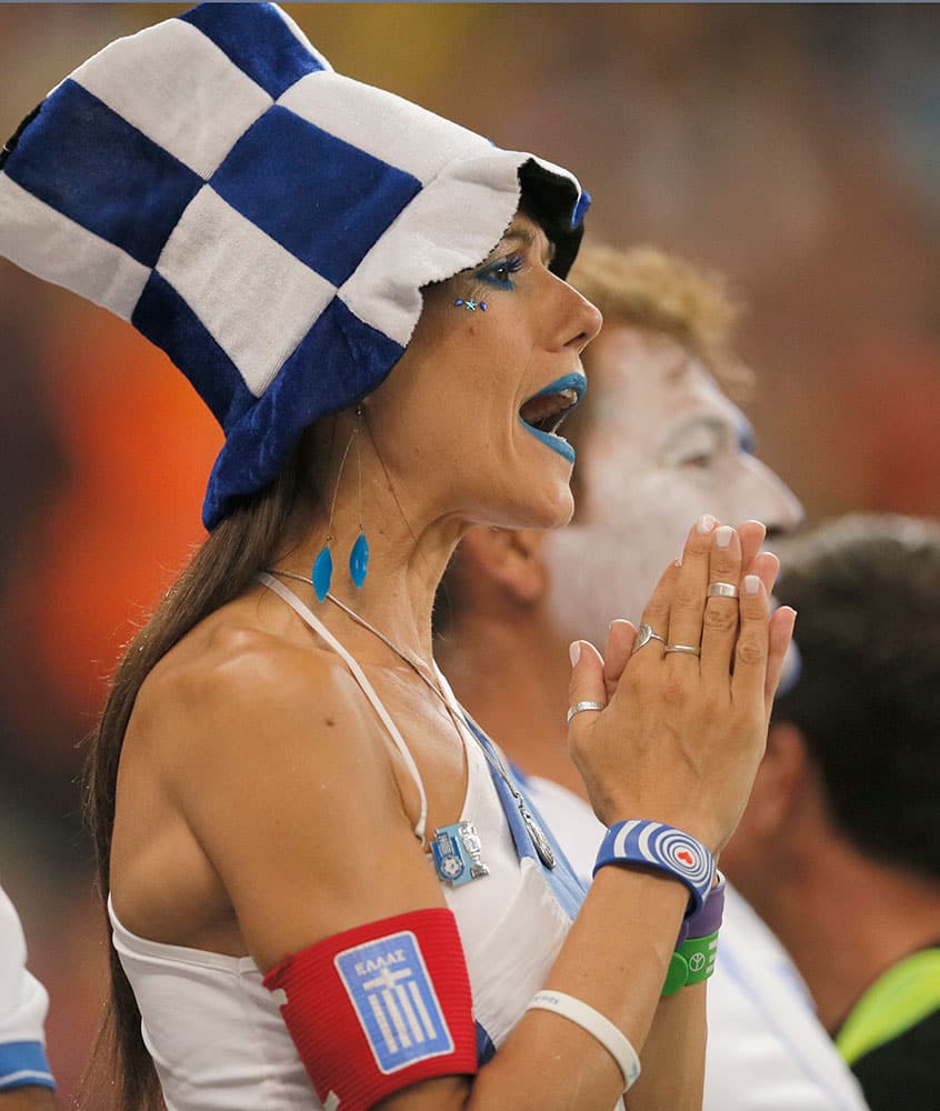 A supporter of Greece shouts during the Euro 2016 group F, qualifying match between Romania and Greece at the National Arena stadium in Bucharest, Romania.