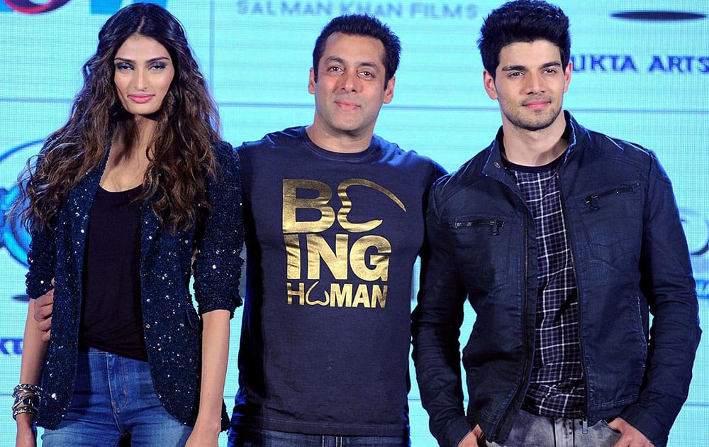 Bollywood actor Salman Khan with debutant actors Sooraj Pancholi and Athiya Shetty during a music launch event in Mumbai.