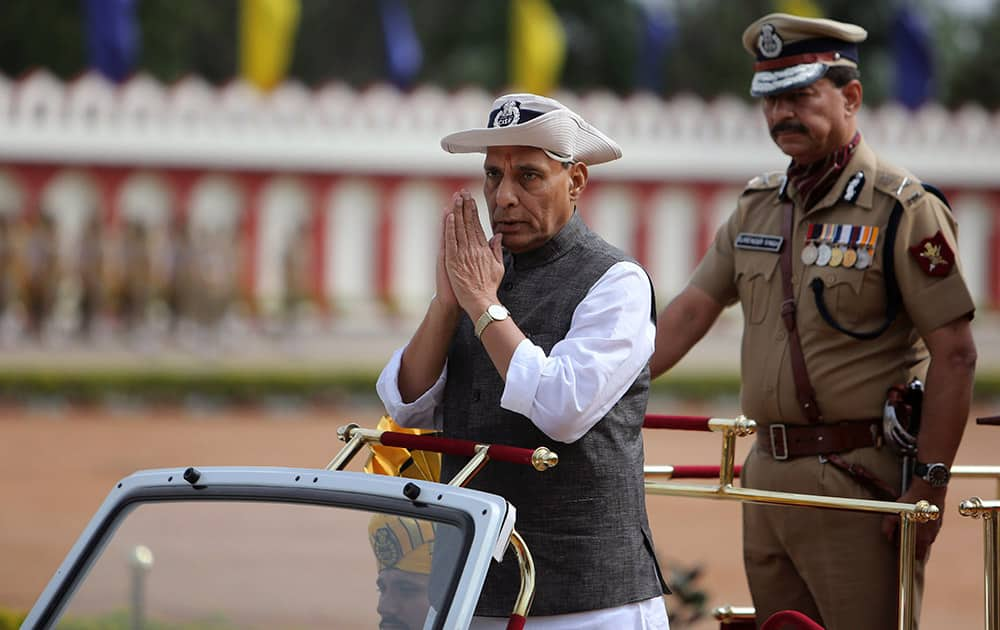 Home Minister Rajnath Singh inspects a guard of honor during a parade ceremony of the Central Industrial Security Force (CISF) at the National Industrial Security Academy (NISA) on the outskirts of Hyderabad.