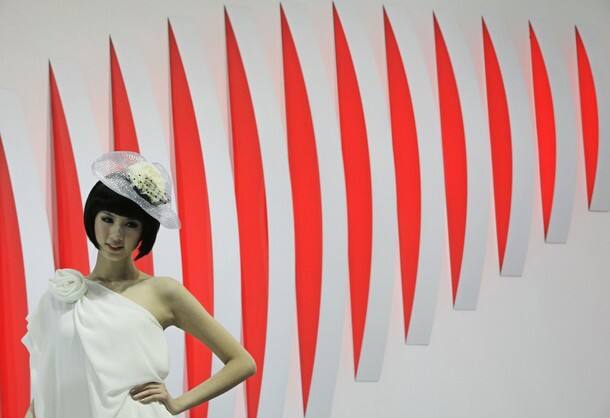 A model poses at the Beijing Auto Show