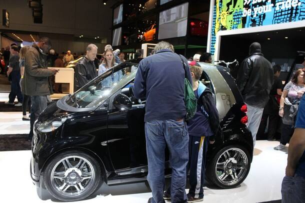 People look at new Smart cars 