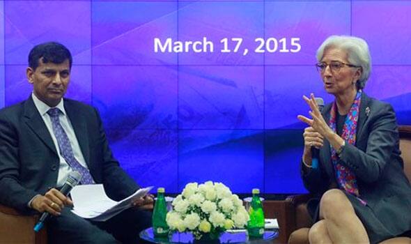 Managing Director of the International Monetary Fund Christine Lagarde, right, speaks as Governor of Reserve Bank of India (RBI) Raghuram Rajan looks on during an event at the RBI headquarters in Mumbai, India, Tuesday, March 17, 2015. 